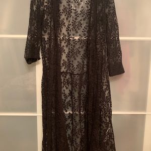 Black duster with hints of velvet